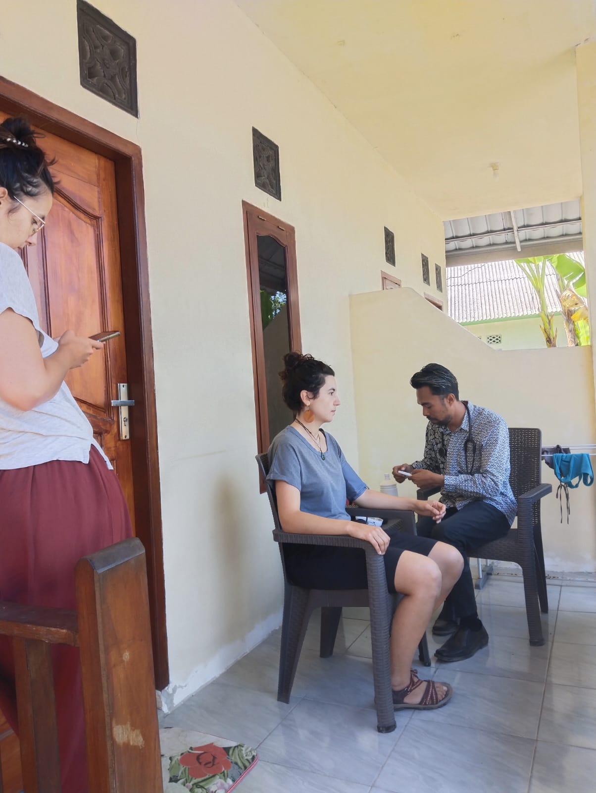 On-site patient care during a home visit by Tete Batu Medical Centre